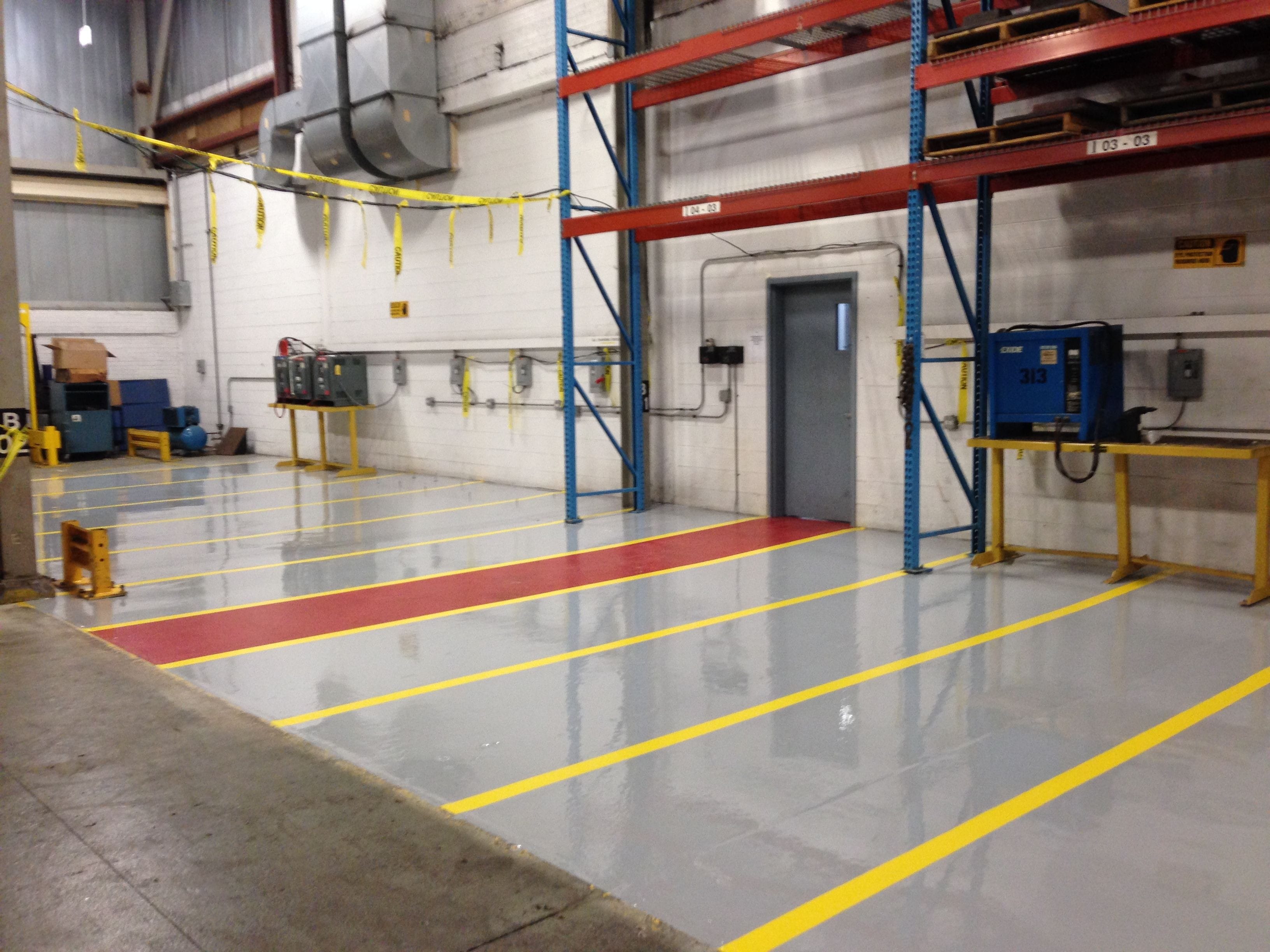 battery charging area in grey and yellow acid resistant epoxy
