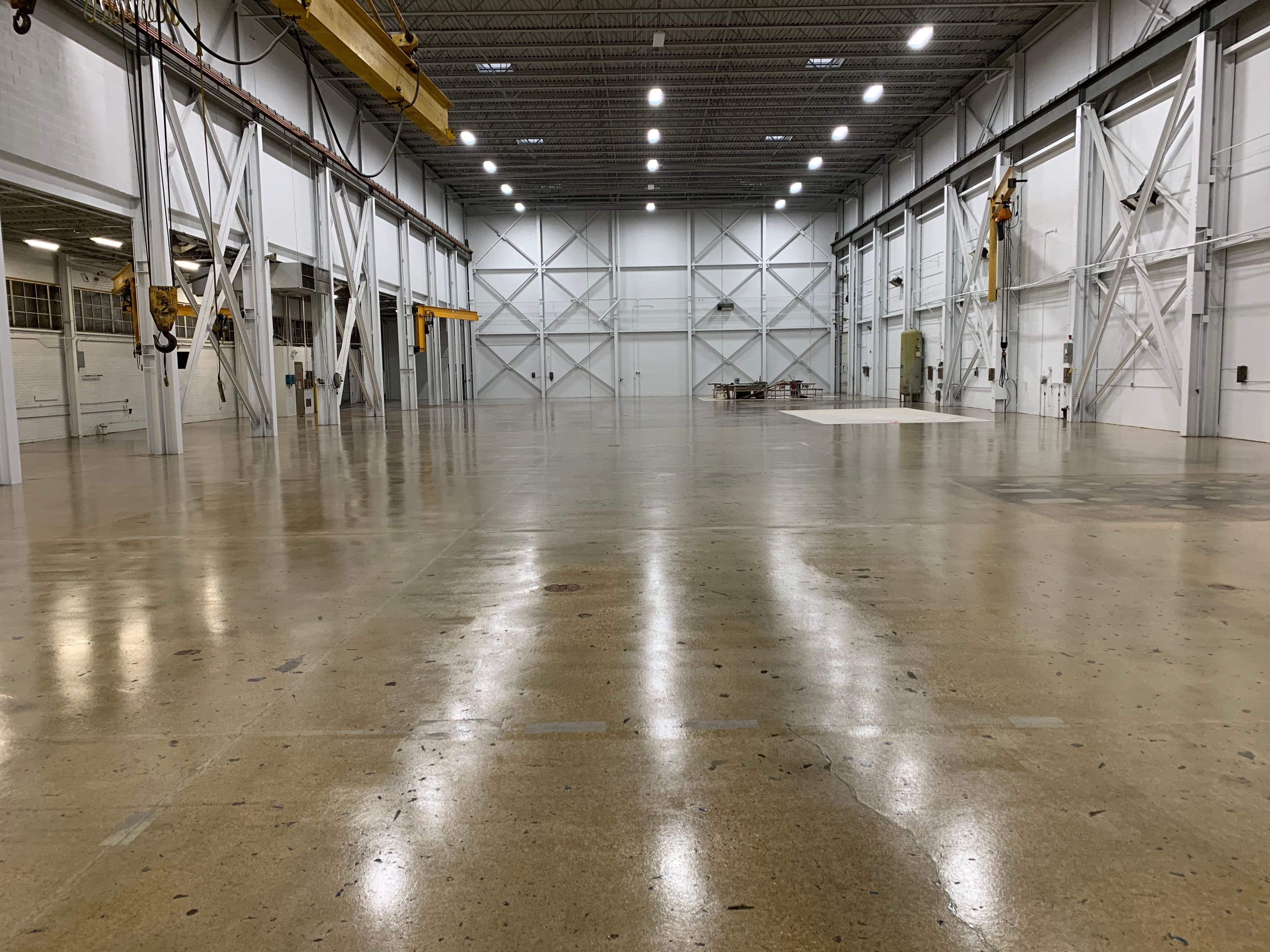 Concrete scrubbing is a great way to clean a warehouse floor. 