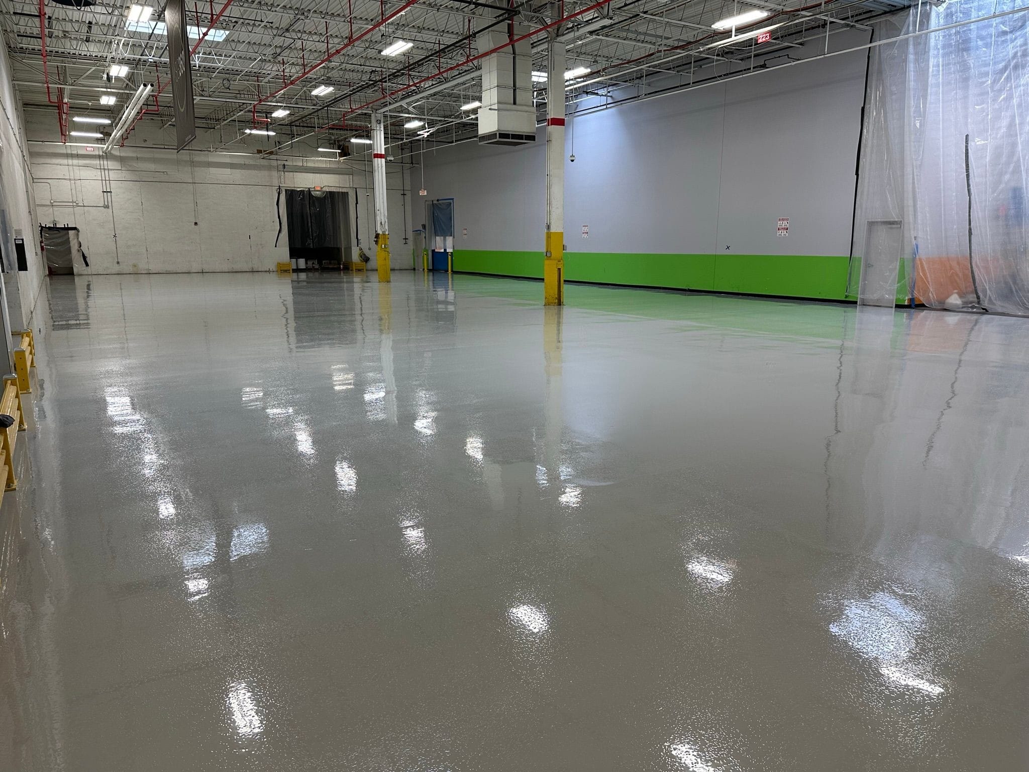 epoxy coating for machine press area with slip-resistant surface.