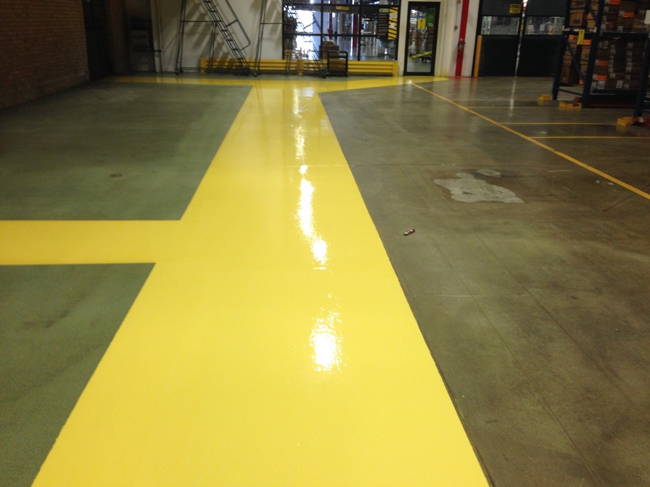 Yellow coating for pedestrian walk way in warehouse