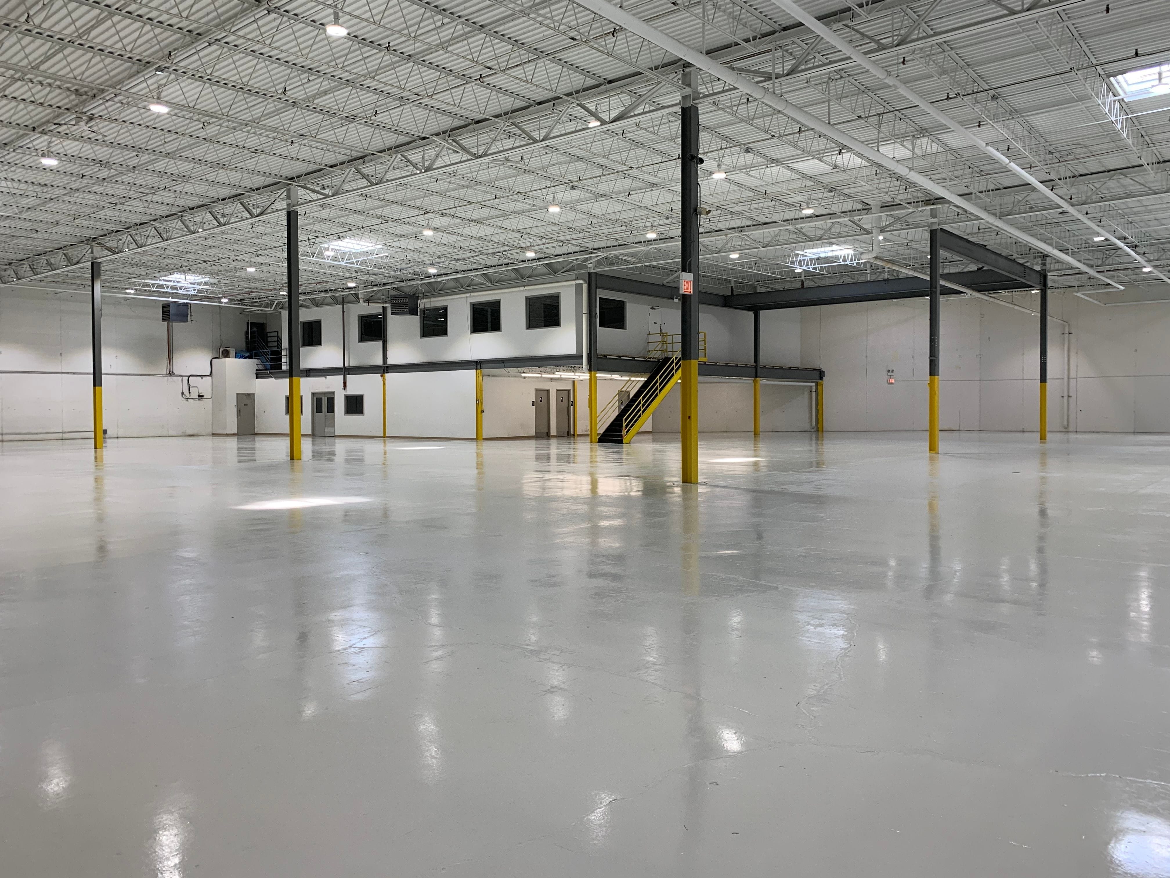 battery charging area in grey and yellow acid resistant epoxy