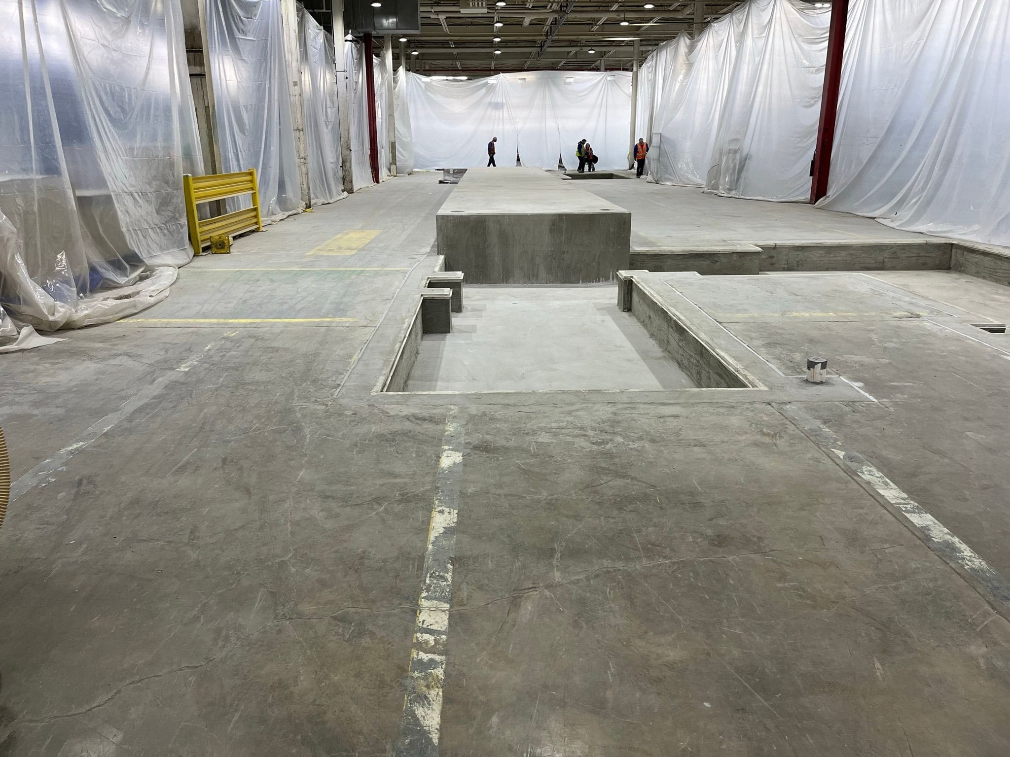 concrete floor in machine press area